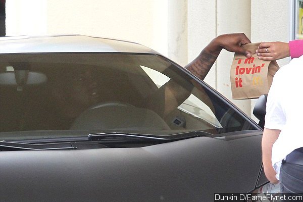 Kanye West Picks Up McDonald's at the Drive-Thru in His $750,000 Lamborghini