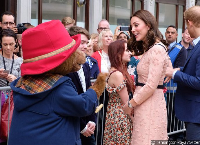 Kate Middleton Makes Surprise Appearance at Charity Event, Dances With Paddington Bear