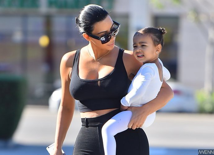 Kim Kardashian and North West Wear Matching Snow Outfit. See the Adorable Pics!