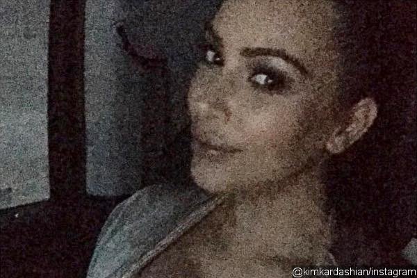 Kim Kardashian Celebrates 45 Million Instagram Followers With Grainy Selfies Showing Ample Cleavage