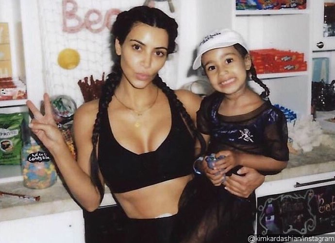 Kim Kardashian Denies Dressing Daughter North in Silk 'Corset' After Online Outrage