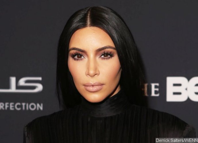 Kim Kardashian Flashes Nipples in Flimsy Top as She Steps Out Braless