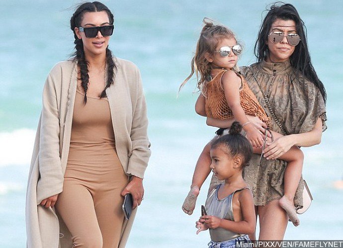 Kim Kardashian Forgets Her Beachwear During Beach Day With North, Penelope and Kourtney