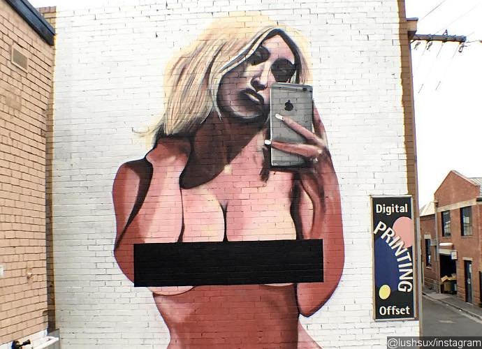 Kim Kardashian's Nude Selfie Mural Gets Vandalized With the Word 'SLUT'
