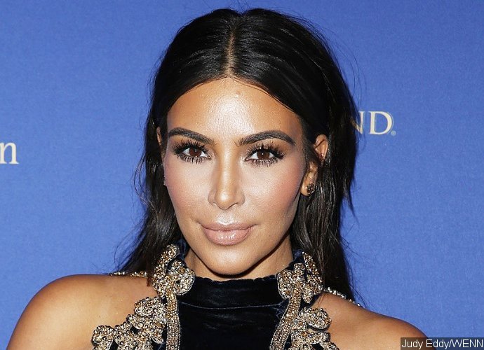 Kim Kardashian Strips Down to White Undies on National Selfie Day