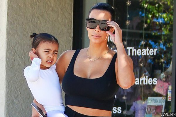 Kim Kardashian Struggles to Coax Upset North West