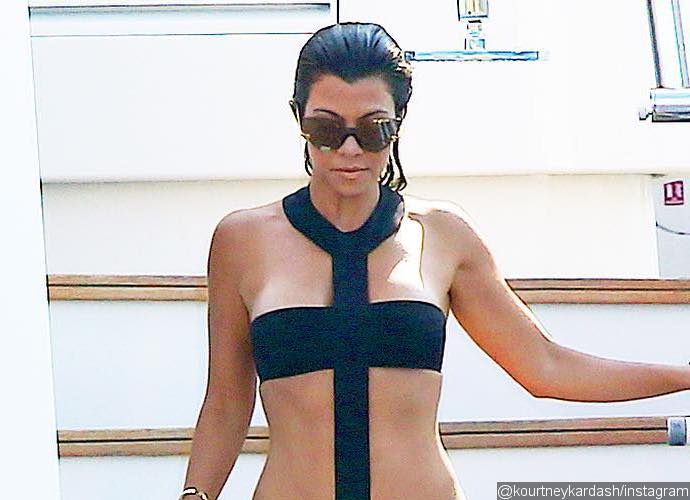 Kourtney Kardashian Shares Cheeky Photo of Her in Bikini With an Ice Cream Between Her Thighs