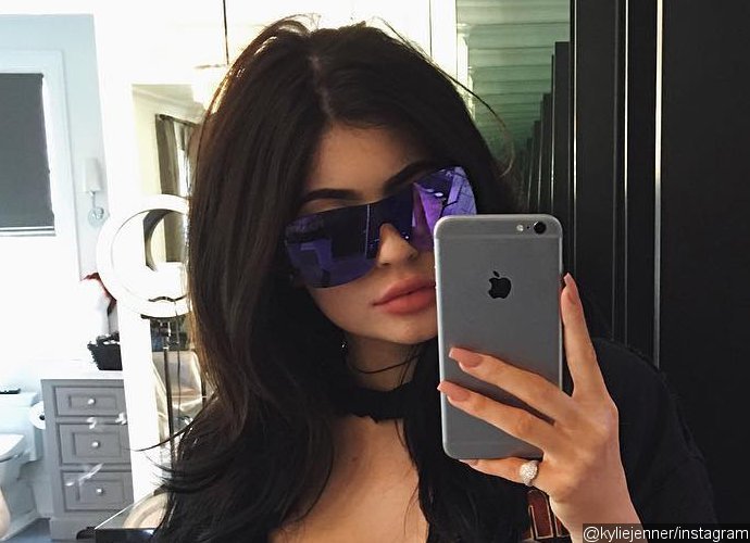 Kylie Jenner Flashes Her Bra Like Kendall After Denying Boob Job Rumors