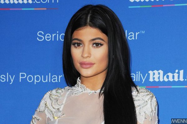 Kylie Jenner Flaunts Flat Abs in Crop Top and Tight Pants