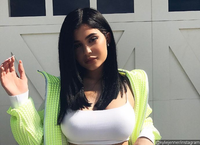 Kylie Jenner: New Mom's Wax Figure Steps Out with Stroller