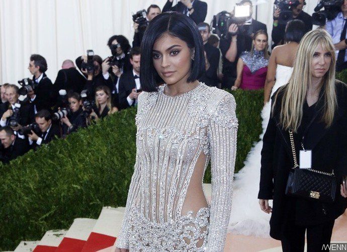 Kylie Jenner Suffers Wardrobe Malfunction in Racy Dress - Find Out How She Fixes It!