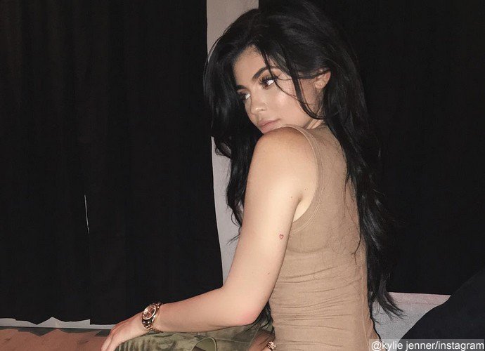 Officially Back On? Kylie Jenner Tags Tyga on Her Booty In 