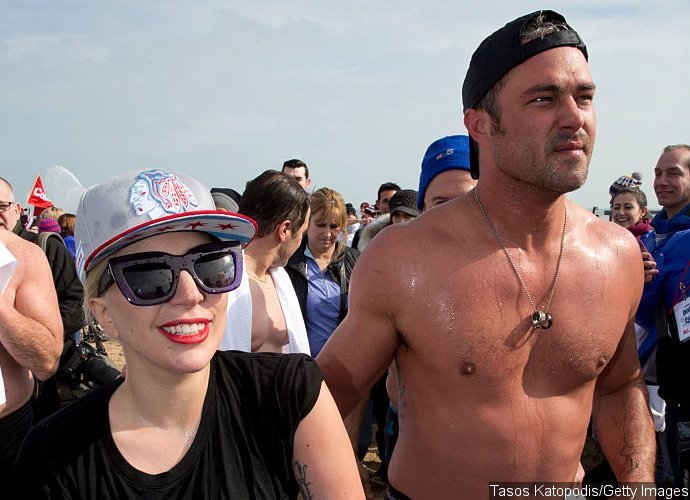 Lady GaGa and Taylor Kinney Take the Polar Plunge for Charity