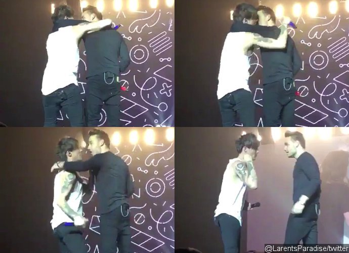 Video: Liam Payne and Louis Tomlinson Accidentally Kiss During 1D Concert