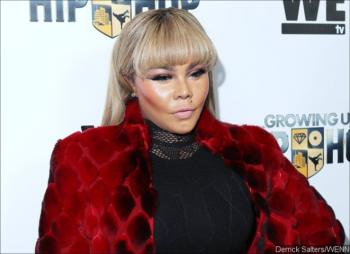 Lil' Kim Responds to Photoshopped Image Which Makes Her Booty Larger