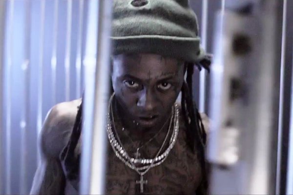 Lil Wayne Raps Inside a Cage in Music Video for 'CoCo' Remix