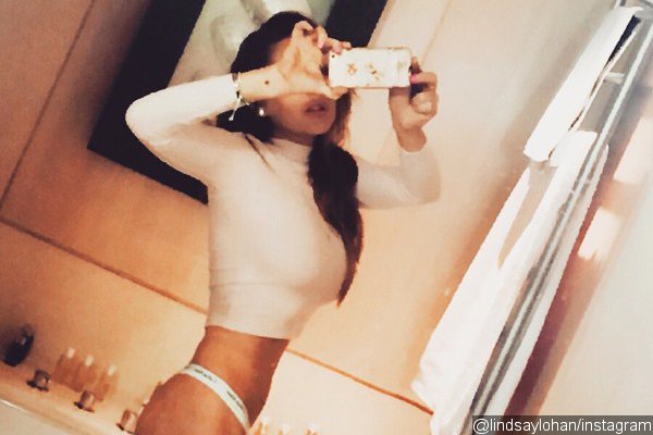 Lindsay Lohan Accused of Photoshopping Her Waist in Underwear Selfie