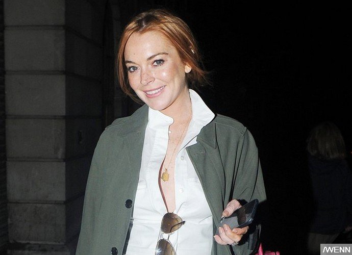 Lindsay Lohan Reportedly Spits in Customer's Face During 'Racist' Meltdown
