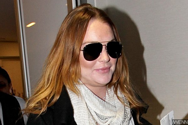 Lindsay Lohan Suffering From Incurable Virus During Holiday Vacation