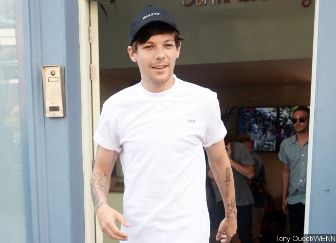 Louis Tomlinson Shuts Down One Direction Feud Rumors: 'We're All Such Good Mates'