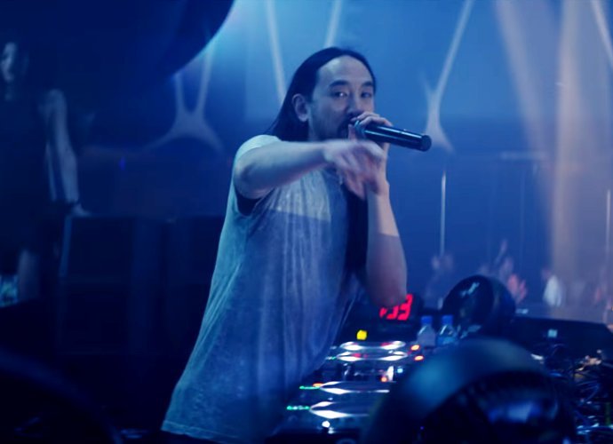 Louis Tomlinson Takes You on a Trip Around the World in 'Just Hold On' Video Ft. Steve Aoki