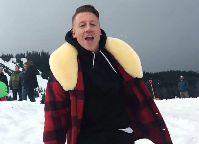 Macklemore Goes Crazy in 'Brad Pitt's Cousin' Music Video