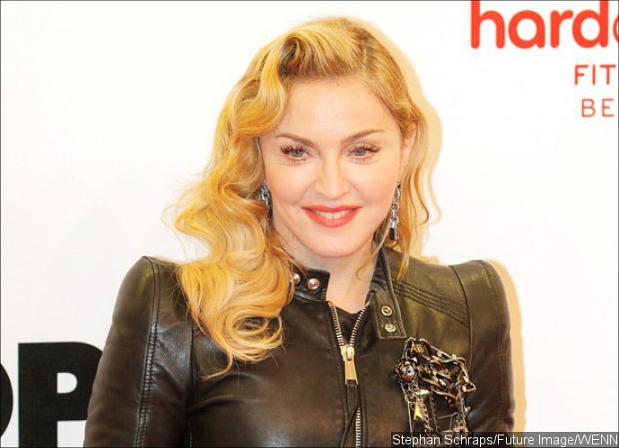 Her Real Age! Madonna's Wrinkled Hands Are in Contrast to Her Face
