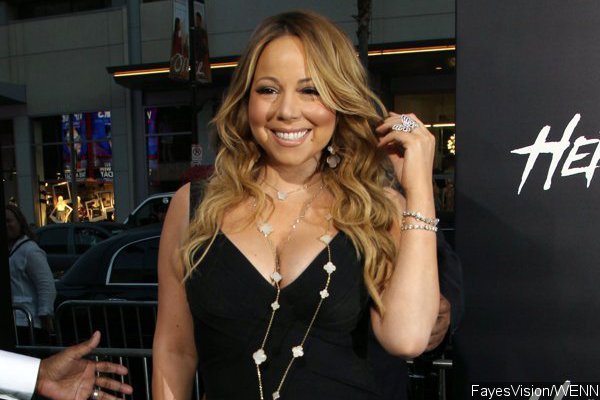 Mariah Carey Officially Signs With Epic Records, Already Starts Recording New Music