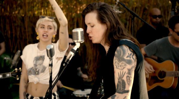 Miley Cyrus And Against Me S Laura Jane Grace Reteam For True