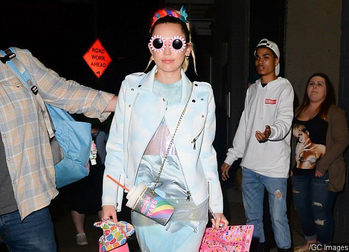 Miley Cyrus Flashes Underboob and Panties in Bizarre Outfit