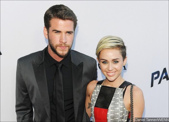 Miley Cyrus Sports New Gold Band on Ring Finger. Is She Secretly Married to Liam Hemsworth?