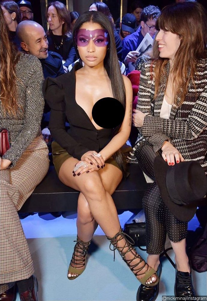 Peek-a-boob! Nicki Minaj Lets Her Entire Boob Hang Out at Paris Fashion Week