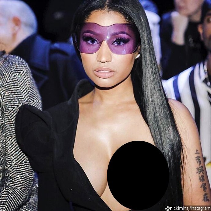 Peek-a-boob! Nicki Minaj Lets Her Entire Boob Hang Out at Paris