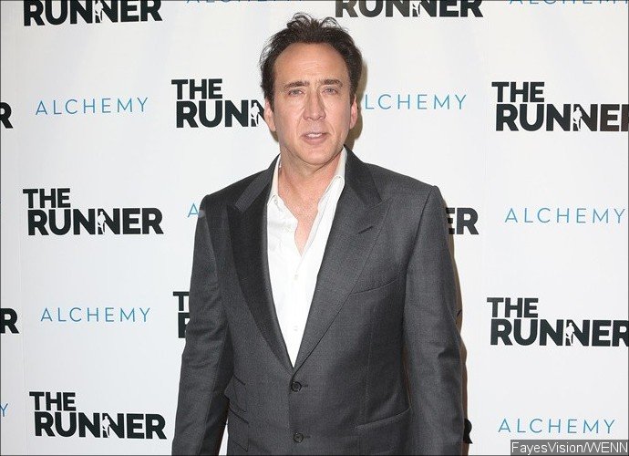Nicolas Cage Spotted Kissing Mystery Woman After Splitting From His Wife