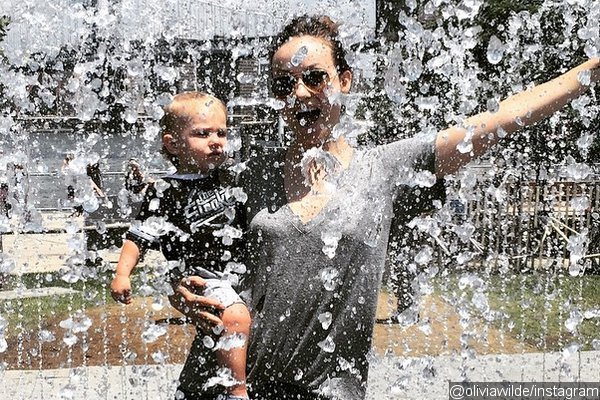 Olivia Wilde Posts Cute Picture With Baby Otis Surrounded by Jetting Water