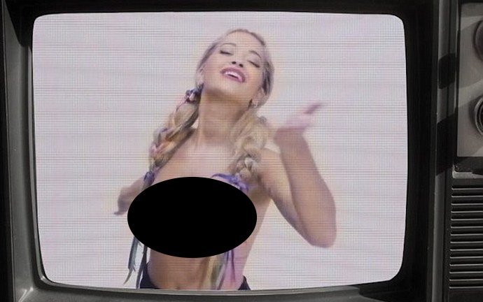 Watch: Rita Ora Drops Her Top in Raunchy Love Advent Video