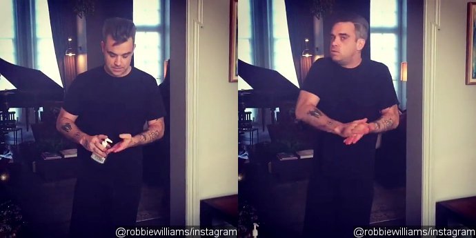 Robbie Williams Responds to That NYE Hand Sanitizer Incident in Hilarious Instagram Post