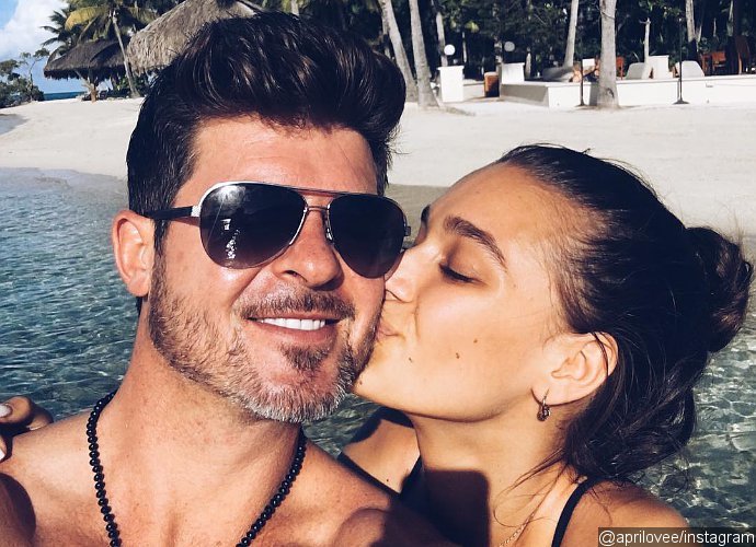 Robin Thicke's GF April Love Geary Shows Off Her Bum While Hinting That They're Married