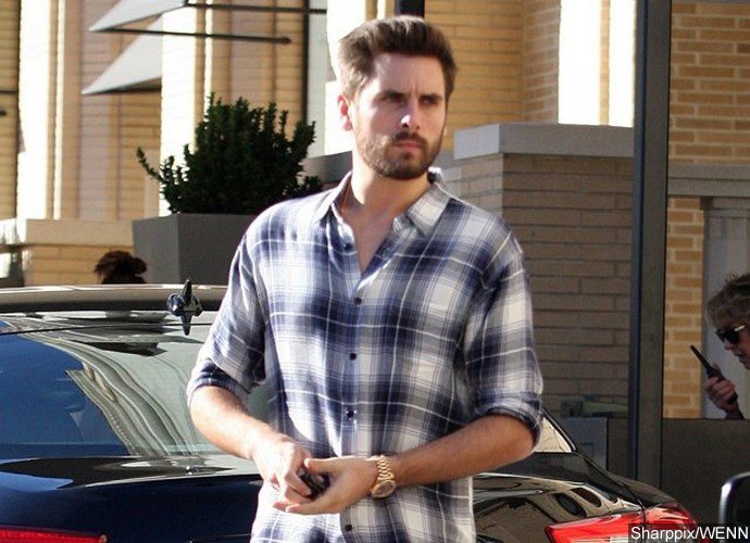 Scott Disick Pictured With Another Women Sitting in His Lap