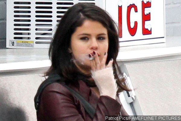 Selena Gomez Smokes in 'Revised Fundamentals of Caregiving' On-Set Picture