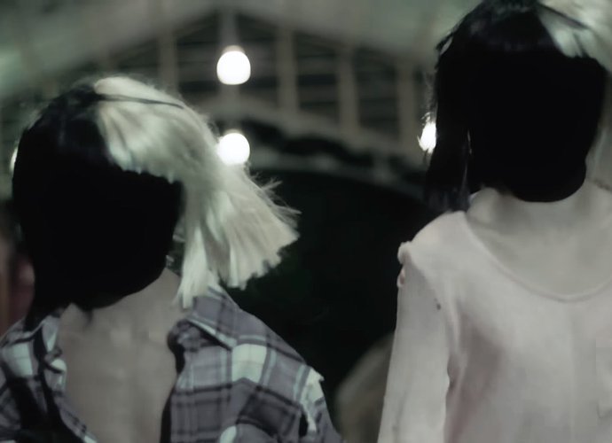 Sia Parallels 'Lion' Narratives in 'Never Give Up' Lyric Video