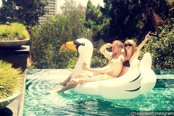 Taylor Swift and Calvin Harris Ride Inflatable Swan Together in New Pic