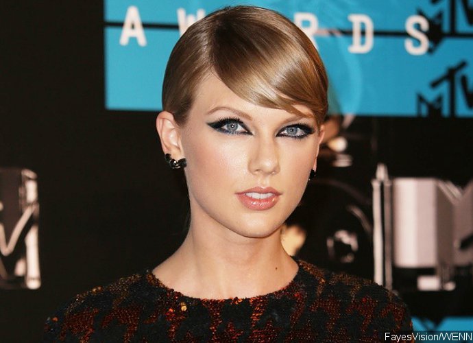 Taylor Swift Calls Her Cat 'Monster' for This Cute Pic Taken by Calvin Harris