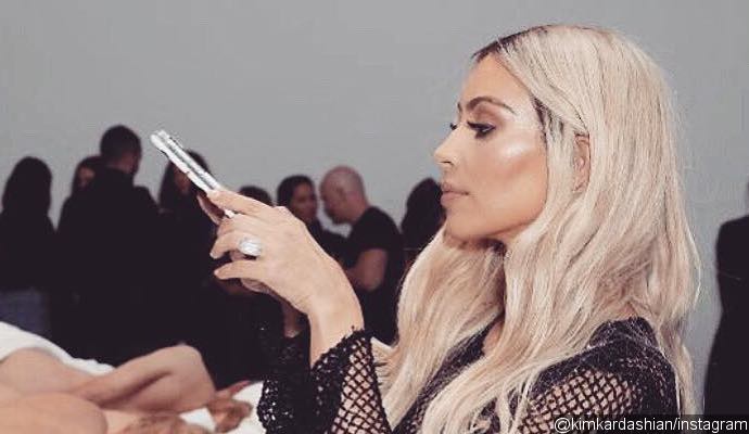 Taylor Swift Fans Slam Kim Kardashian for Sharing BTS Pic From Kanye West's 'Famous' Video