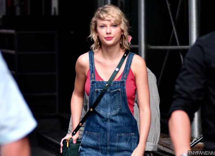 Taylor Swift Steps Out in NYC With New Curly Hairstyle