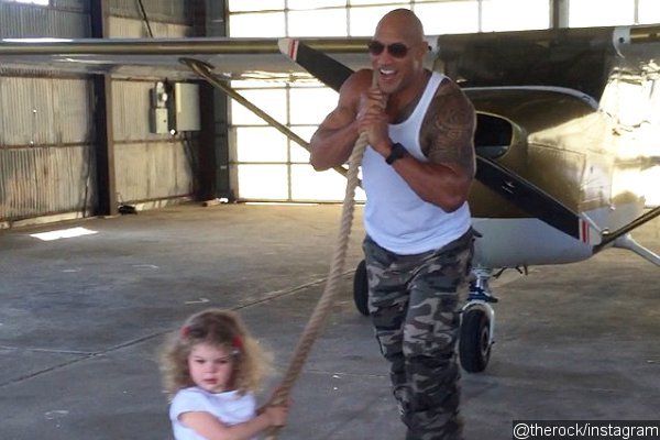 Video: The Rock Helps 2-Year-Old Girl Pull Airplane on Set of 'Central Intelligence'