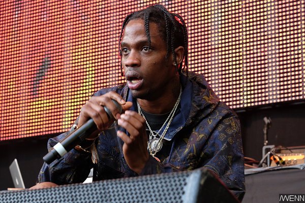Travi$ Scott Arrested at Lollapalooza for Encouraging Fans to Jump ...