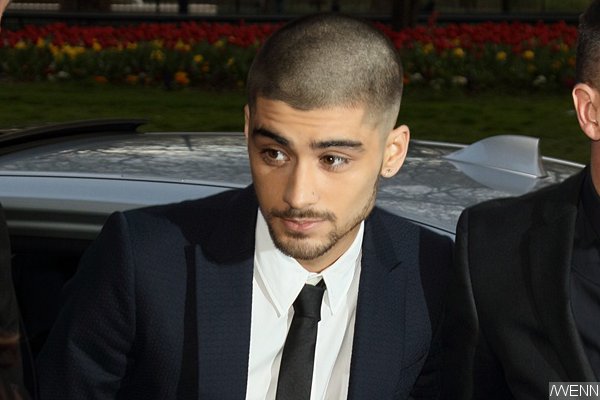 Zayn Malik Gets Booed When His Face Appears on Screen at One Direction's Concert