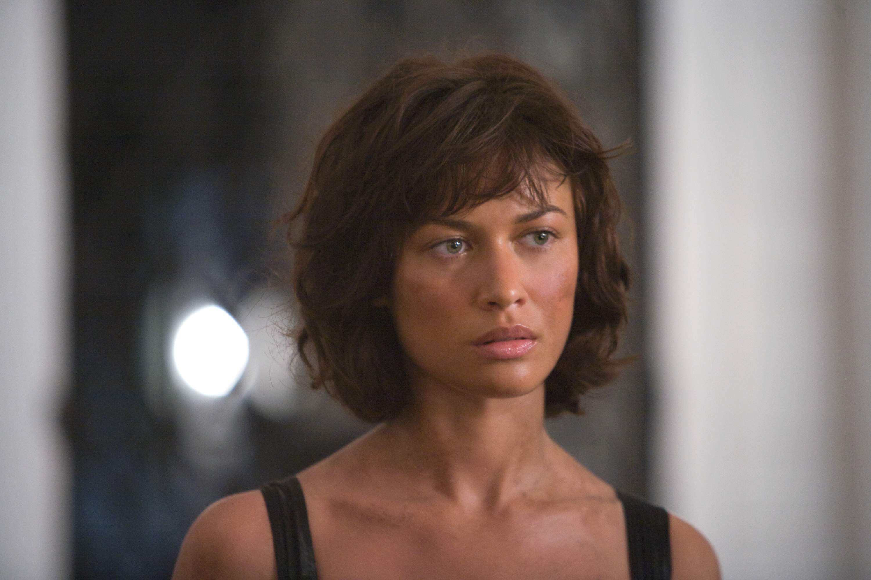 Camille (OLGA KURYLENKO) returns to the Grand Hotel Bolivia after her ordeal at the hands of Greene. Location: Casco Viejo, Panama City, Panama. Photo by: Karen Ballard.