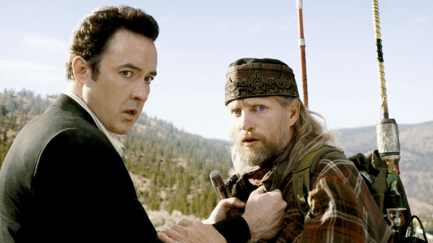 John Cusack stars as Jackson Curtis and Woody Harrelson stars as Charlie Frost in Columbia Pictures' 2012 (2009)